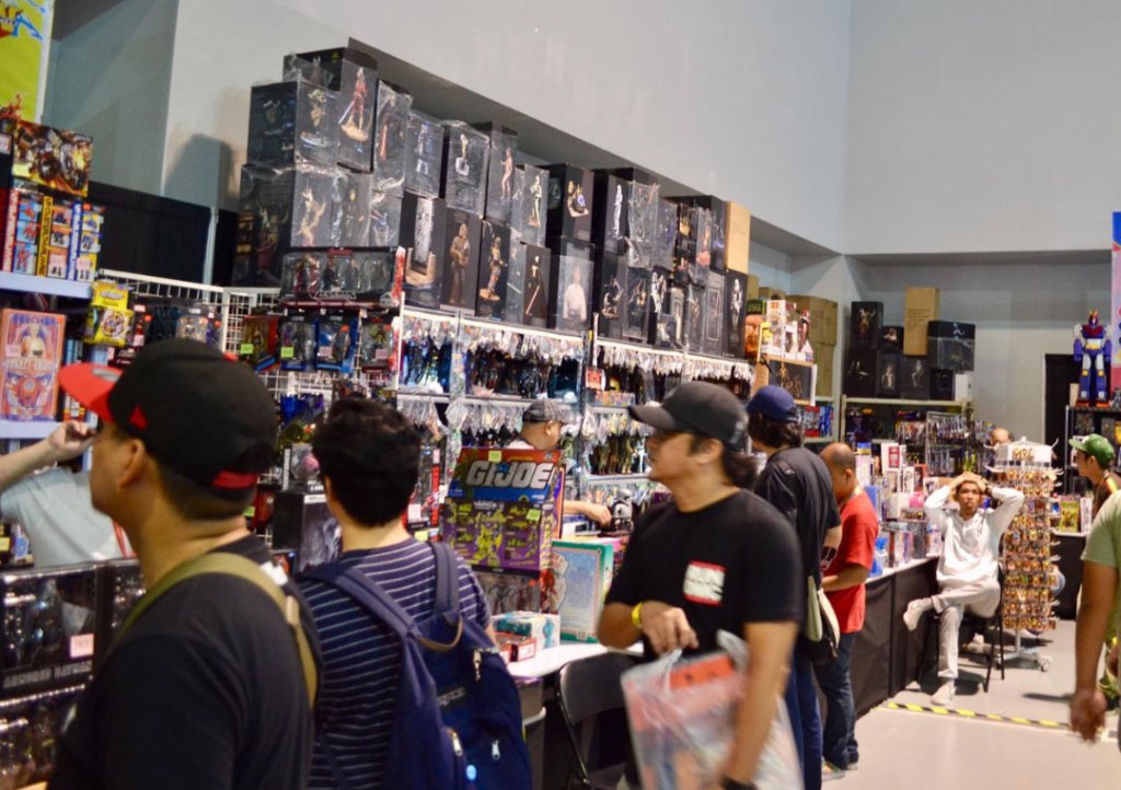 Toy enthusiasts eagerly browse the booths for rare finds 